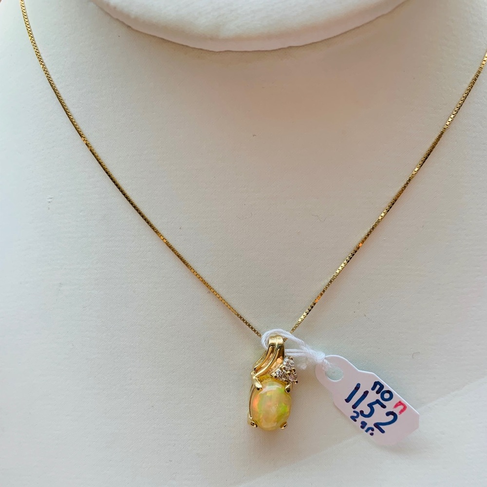 Opal diamond pendant
